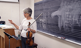 teacher with violin